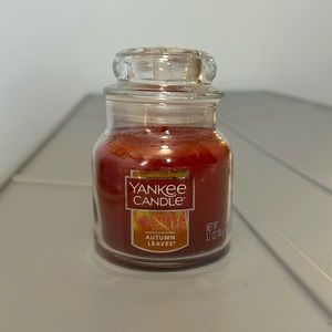 Brand new 3.7 ounce Yankee Candle “Autumn Leaves” scent jar candle